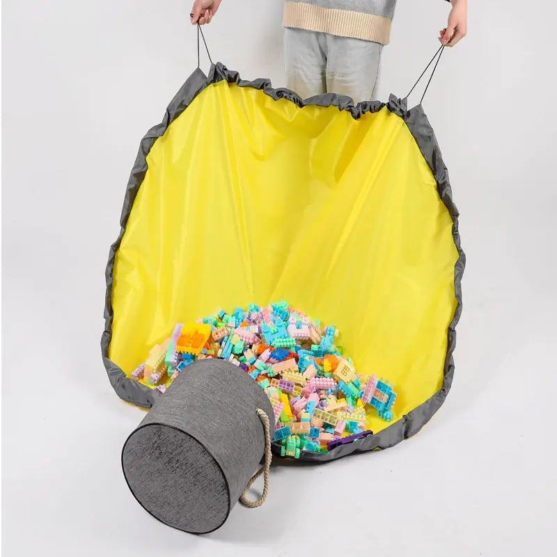 Foldable toy storage mat with basket